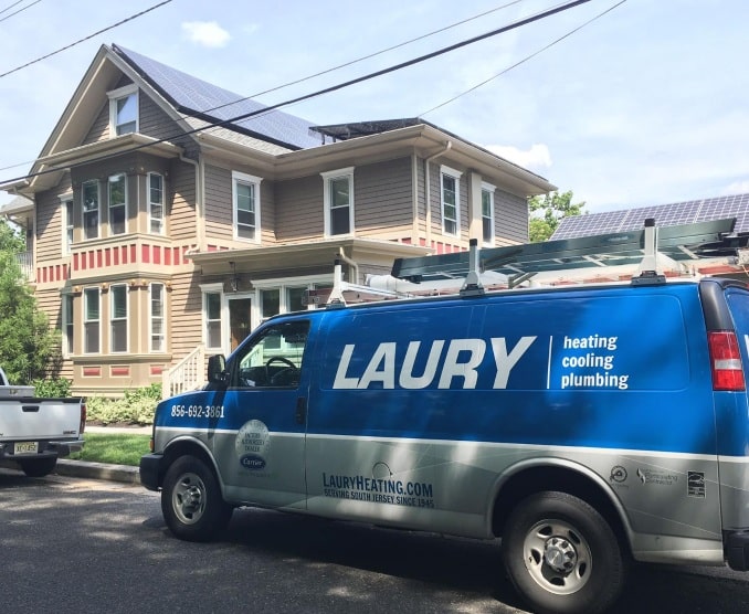 Laury heating truck in front of home
