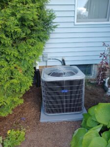 Outdoor central AC unit at a residential home in Millville, NJ during routine repair service.