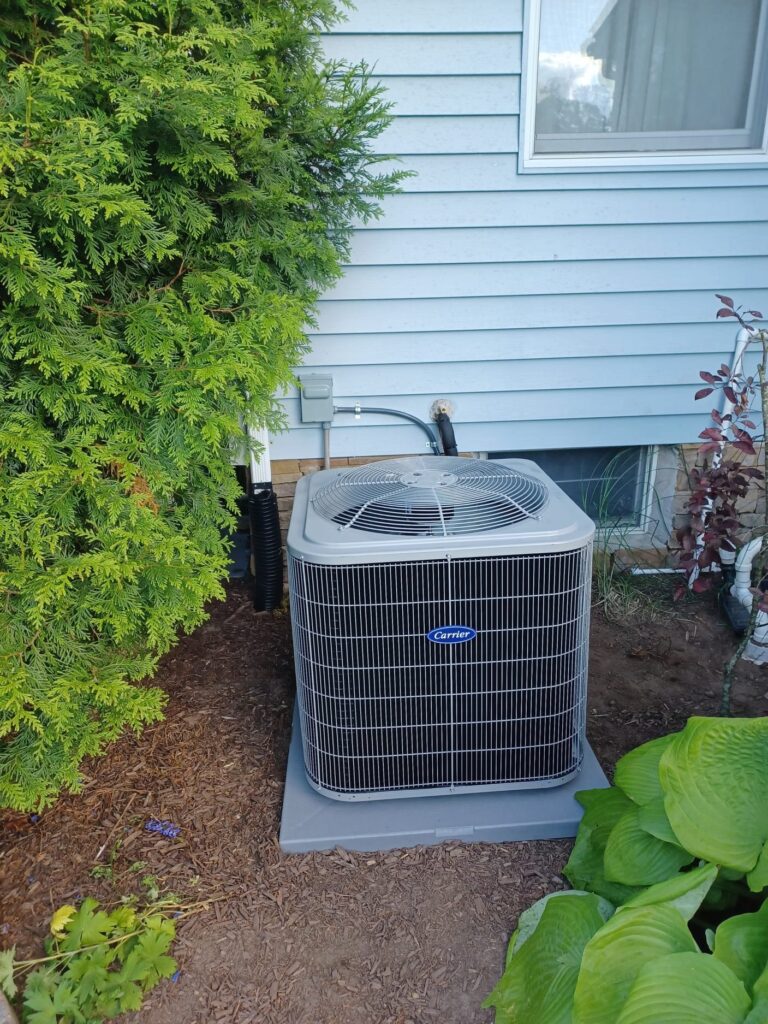Outdoor central AC unit at a residential home in Millville, NJ during routine repair service.