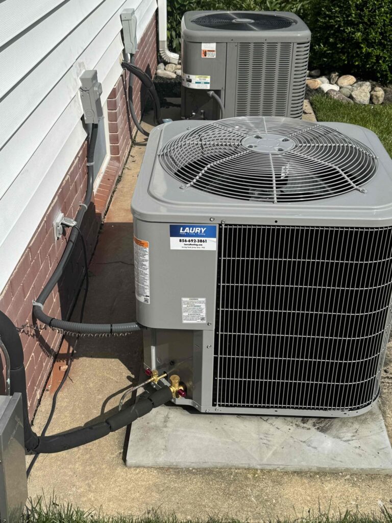 Dual air conditioning units installed by Laury Heating in Hammonton NJ for residential cooling