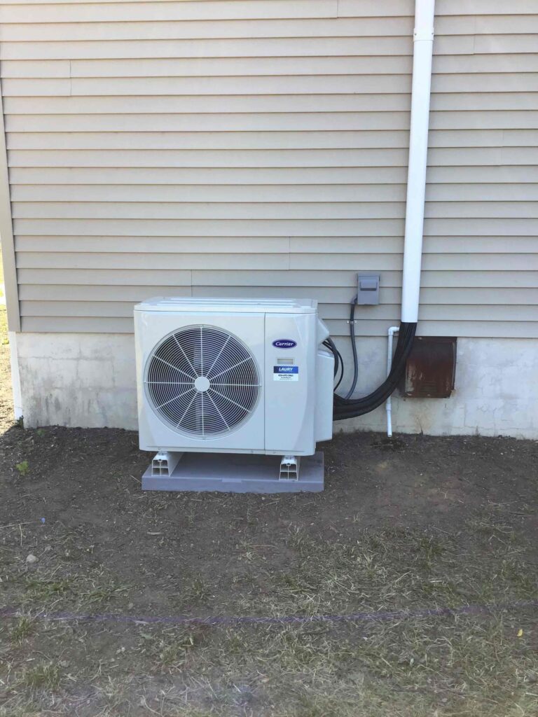 Ductless HVAC system installed on residential home in Vinelaned by Laury Heating Cooling & Plumbing