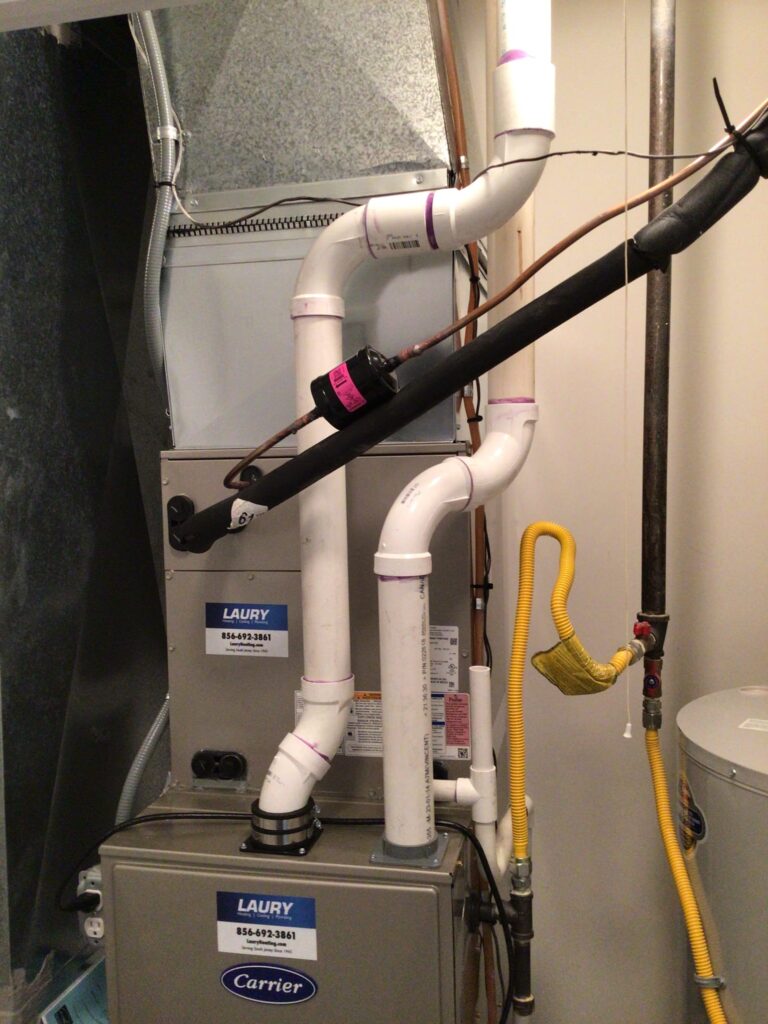 Carrier furnace installed by Laury Heating in Hammonton NJ residential utility room