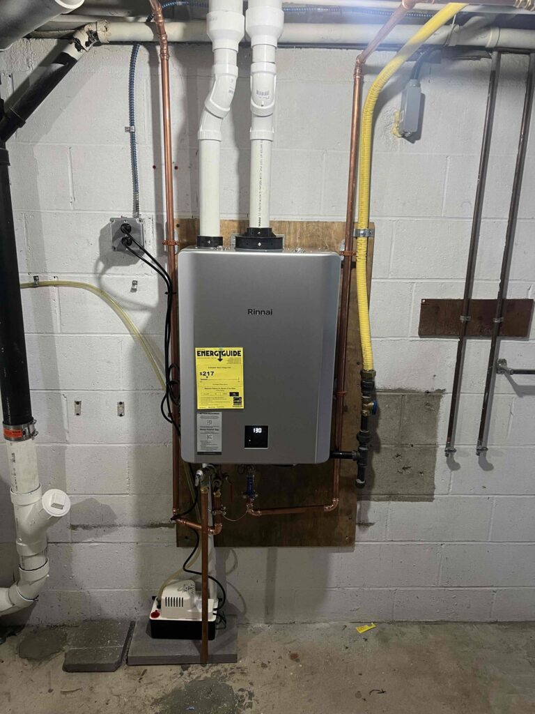 Wall-mounted tankless water heater professionally installed in a South Jersey home