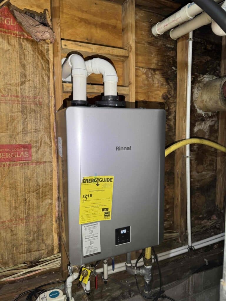 Installed tankless water heater unit in a South Jersey home basement