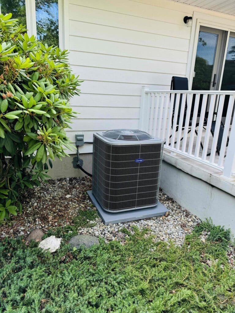 Air conditioner service by Laury Heating at a Vineland NJ home, providing residential cooling service