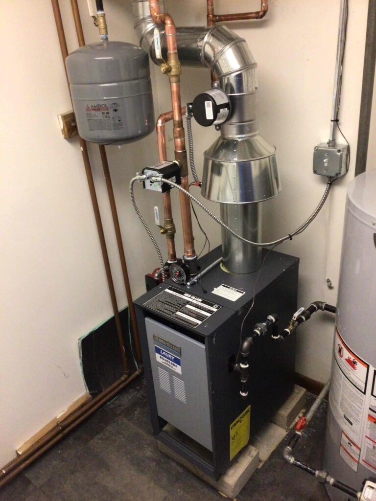 High-efficiency boiler installed by Laury Heating in a South Jersey home basement