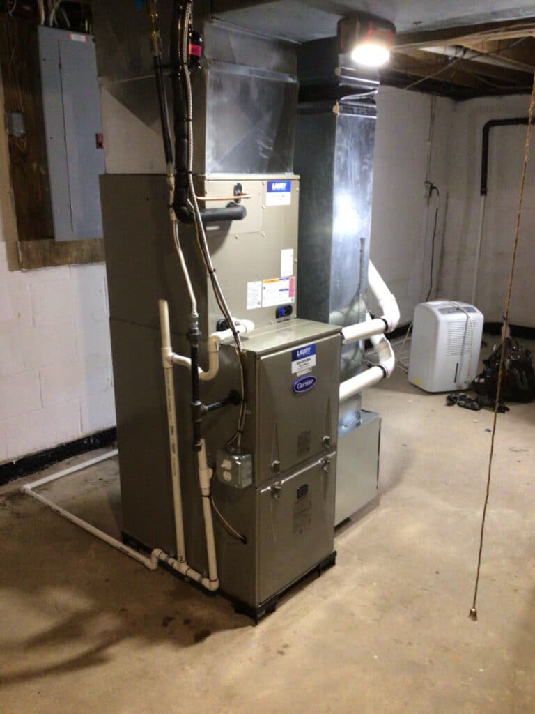 High-efficiency central air HVAC system installed in a Mays Landing, NJ basement by Laury Heating Cooling & Plumbing.