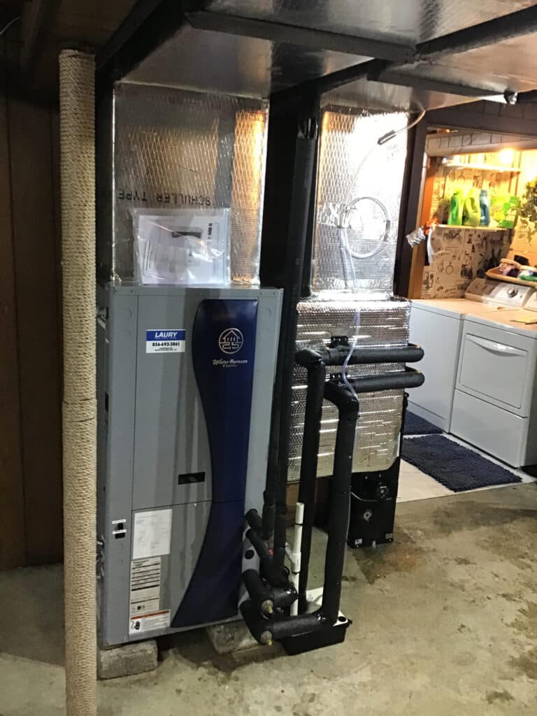 Geothermal heating and cooling system installed by a South Jersey HVAC company in a residential basement.