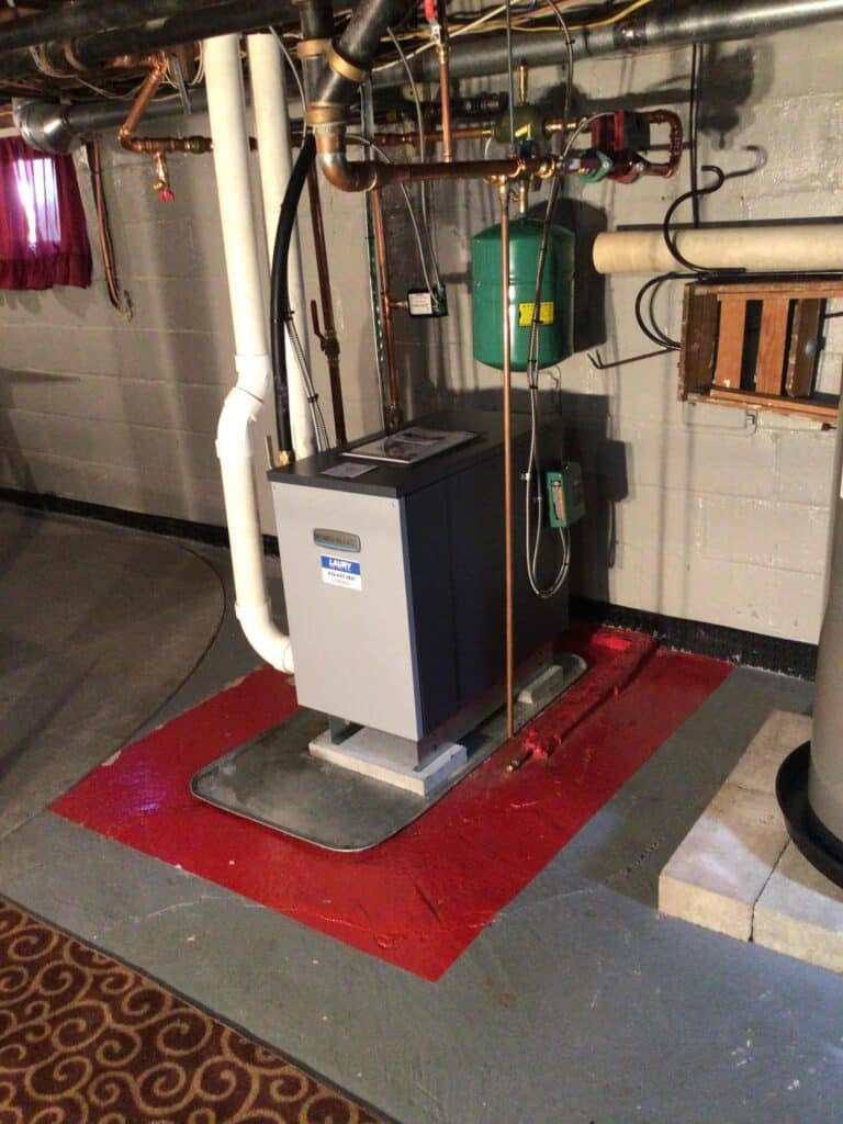 High-efficiency boiler installation completed by Laury Heating in a South Jersey basement