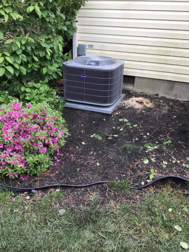 New outdoor AC condenser unit installed by Laury Heating at a residential home in Mays Landing, NJ.