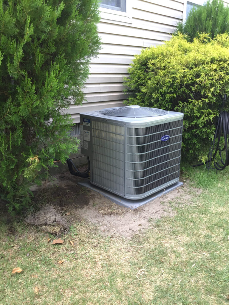 Central air conditioner installed outside a home in Egg Harbor Township NJ