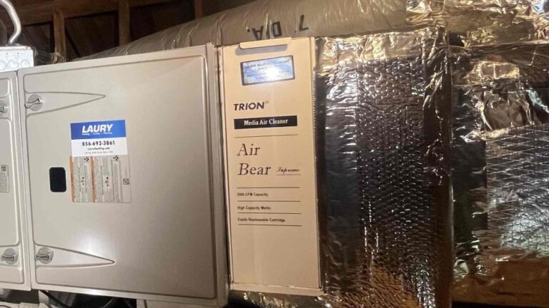 Heating and cooling system installation by Laury Heating in South Jersey, featuring a Trion Air Bear® filter to improve indoor air quality in Mays Landing, NJ.