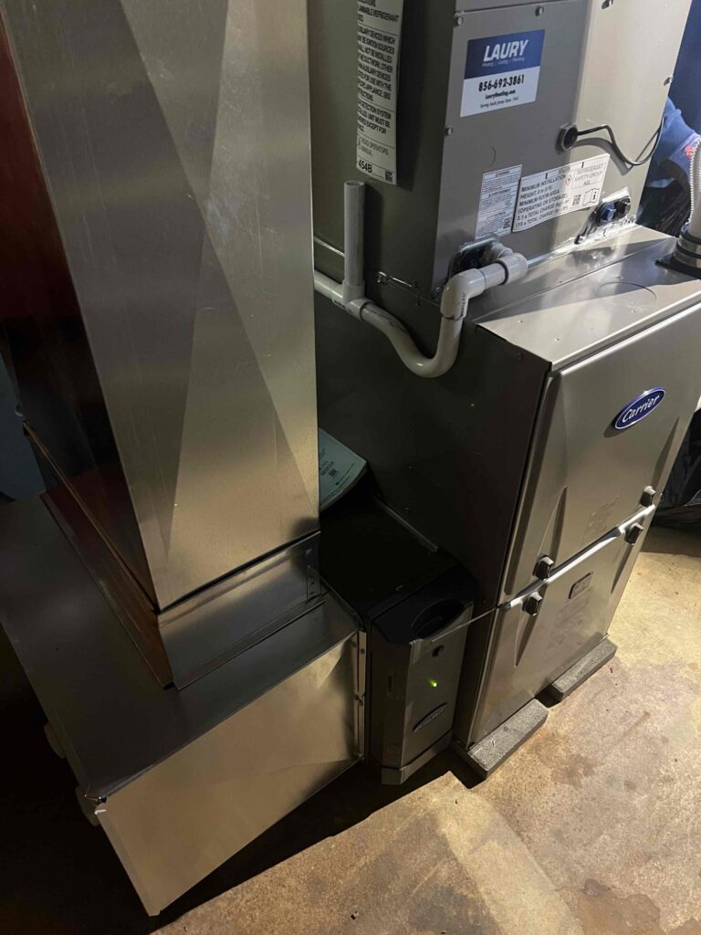 High efficiency furnace unit installed inside a South Jersey home by Laury Heating Cooling & Plumbing