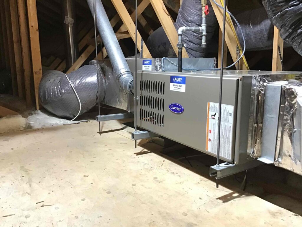 New furnace installed in a South Jersey home, with clean ductwork and metal cabinet visible.