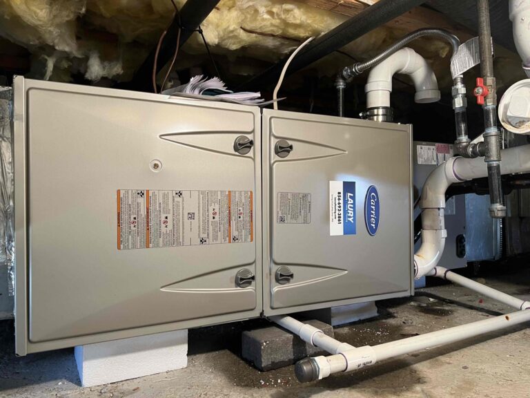 Furnace replacement installation in a crawl space by Laury Heating Cooling and Plumbing in Pennsville NJ