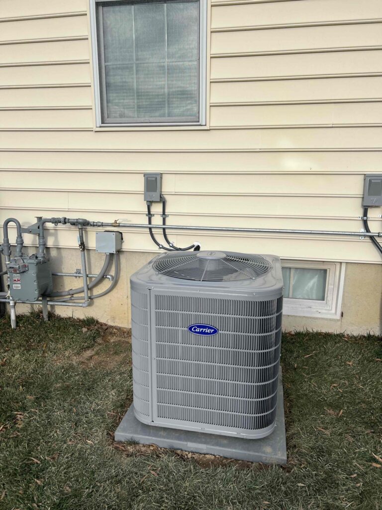 Central air conditioner during professional air conditioning maintenance in a South Jersey home