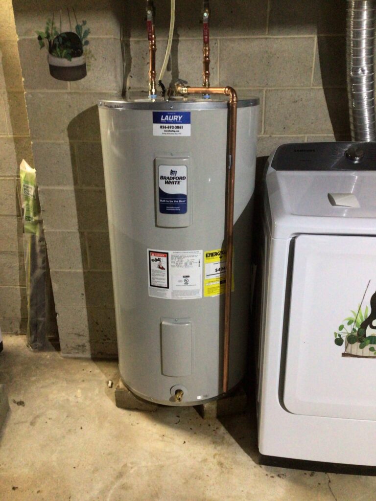 New water heater installed with updated piping and proper connections