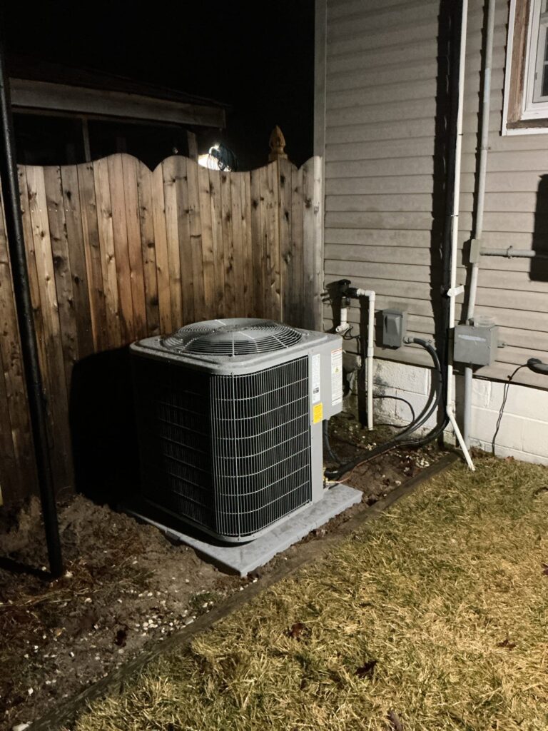 Outdoor air conditioner unit blowing warm air at a home in South Jersey