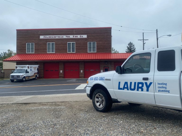 Laury Service vehicle in front of Franklinville, NJ Fire Department