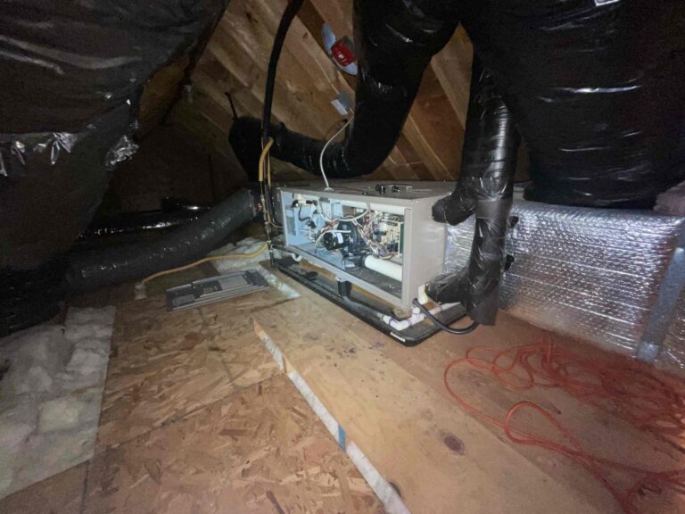 Old attic furnace being evaluated for replacement in a South Jersey home