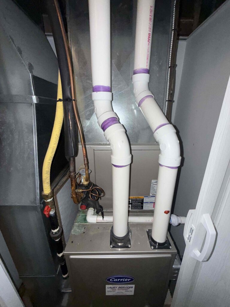 High-efficiency gas furnace inspected during a repair visit in Turnersville, NJ