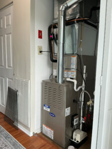 Carrier gas furnace installed in a utility closet at a home in Vineland, NJ.