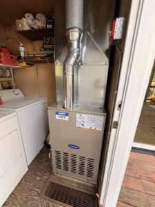 Carrier gas furnace installed in a utility closet at a home in Mays Landing, NJ.