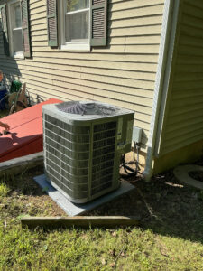 New Carrier outdoor air conditioning unit beside a West Main Street home in Alloway Township.