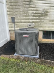 Lennox outdoor air conditioner installed beside a home on Mills Lane in Williamstown, NJ.