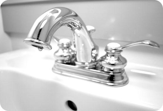 New clean and shiny faucet on sink